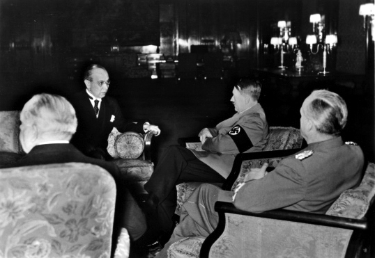Adolf Hitler in conversation with Czechoslovakian foreign minister František Chvalkovský in Berlin's chancellery